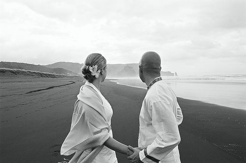 Jon and Marja at their wedding on Piha Beach in New Zealand.